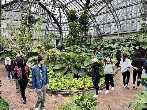 Visitors at the Garfield Park Conservatory, one of the largest greenhouse botanical conservatories in the US.